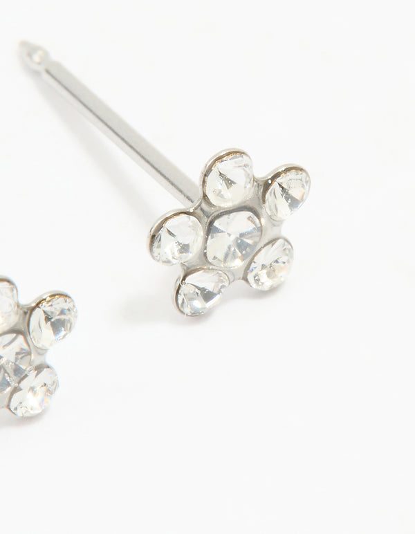 Explore dainty surgical stainless steel cubic zirconia daisy piercing studs with in silver and clear post detail view