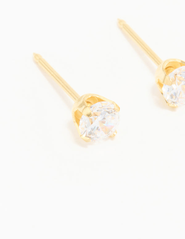 Elegantly designed 24K gold plated surgical stainless steel 4MM cubic zirconia piercing stud with clear accents close up view