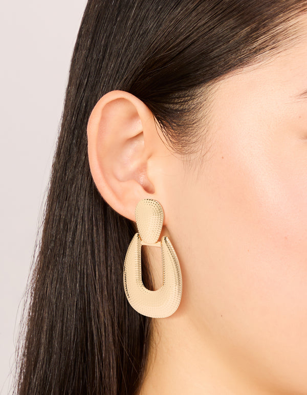 Gold Dot Textured and drop Earrings _on body