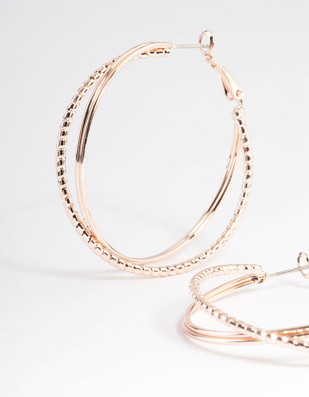 Rose Gold Textured Cross Over Hoop Earrings