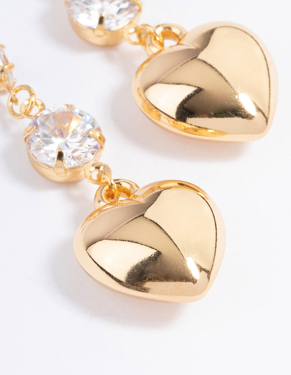 Gold Plated Cubic Zirconia Graduated Puffy Heart Drop Earrings