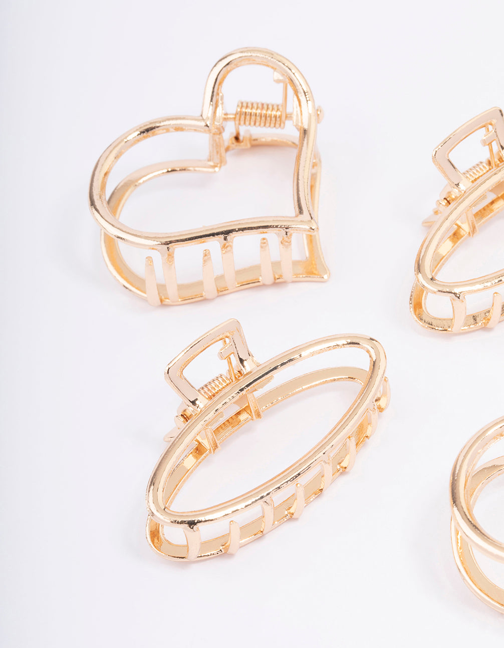 Crafted with solid heart and oval gold hair claw clip 4-pack side view