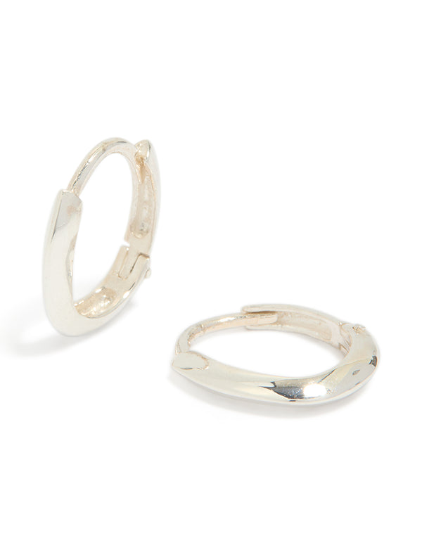 Showcasing chubby hoop earrings crafted from sterling silver with oval cut in a polished finish front view
