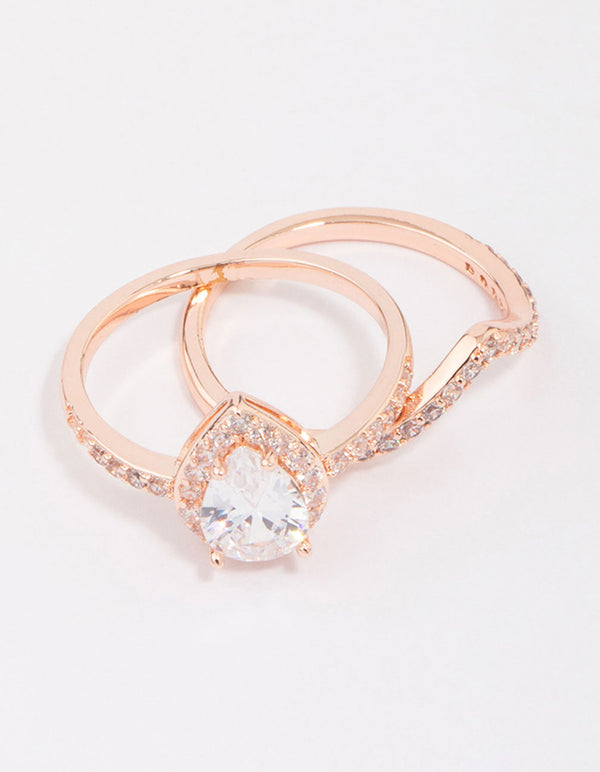Showcasing rose gold crowned pear diamante ring with stone cut accents side detail view
