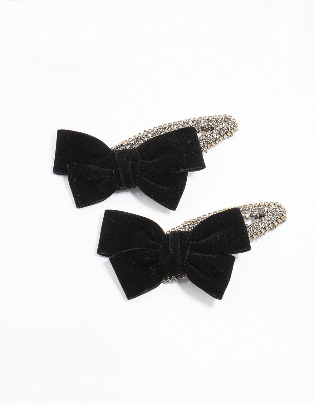 Showcasing mixed beaded velvet bow clips in a 2-pack with solid black and silver colors front view