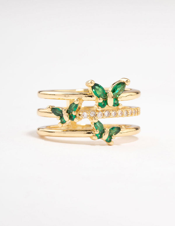 Beautiful triple butterfly band ring in plated material with emerald cut stones and green accents front view