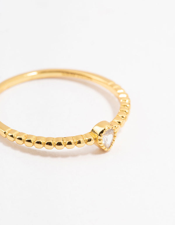 Elegant gold plated sterling silver ring with pear cut cubic zirconia close up view