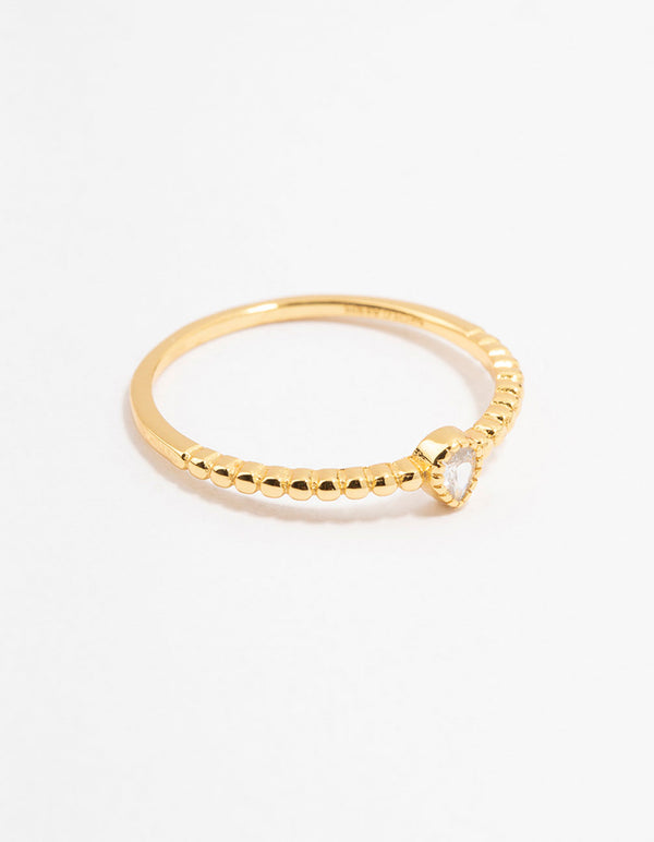 Showcasing a gold plated sterling silver ring featuring pear cut cubic zirconia front view