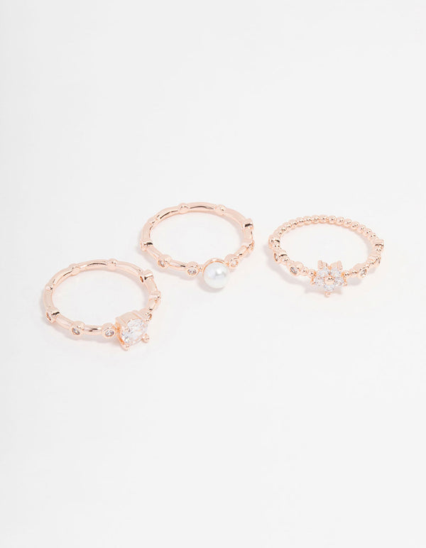 Discover this rose gold plated cubic zirconia pearl bamboo ring in a 3-pack featuring floral design dainty styling front view