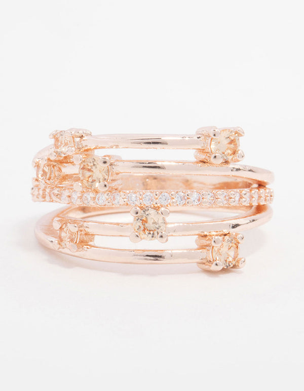 Featuring a statement rose gold plated cubic zirconia pave and scatter ring close up view