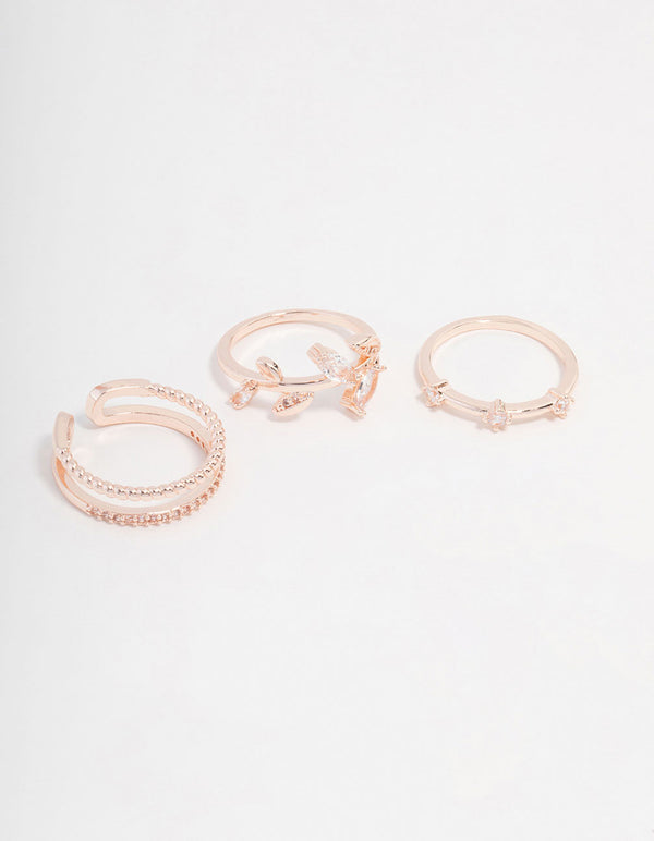 Beautifully crafted set of rose gold plated cubic zirconia leafy station rings front view