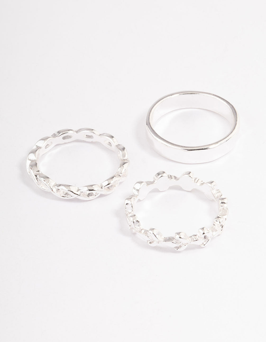 Showcasing silver plain and twisted rings 3-pack front view