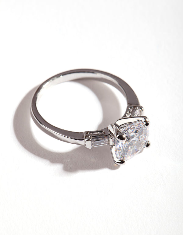 Elegant silver cubic zirconia round stone band ring highlighting prong setting and metal band close up view