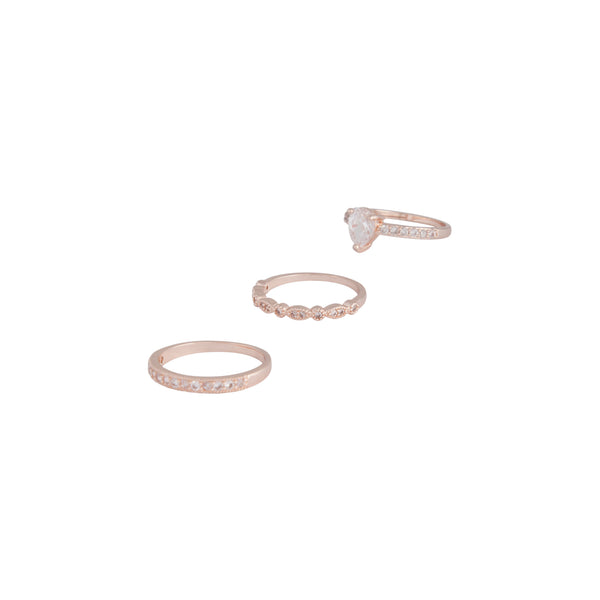 Elegant rose gold cubic zirconia 3 band ring stack featuring heart detail front view