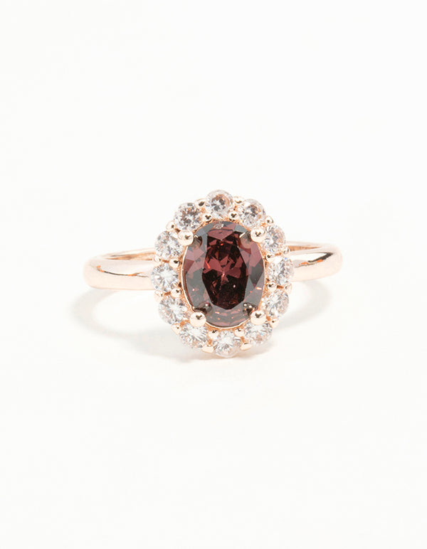 Elegant rose gold pink stone engagement ring with statement design close up view