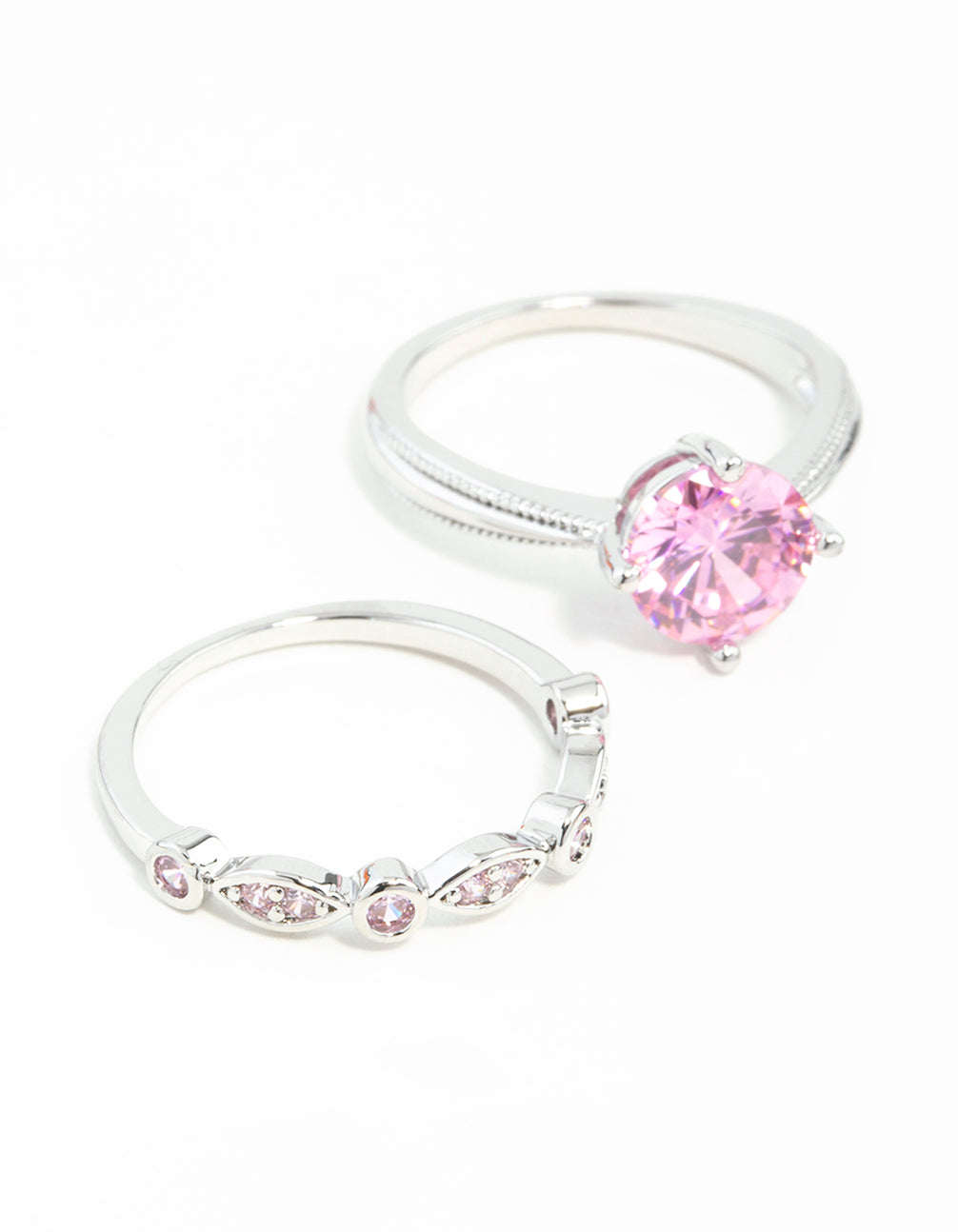 Showcasing cubic zirconia rings in silver with pink and lavender accents close up view