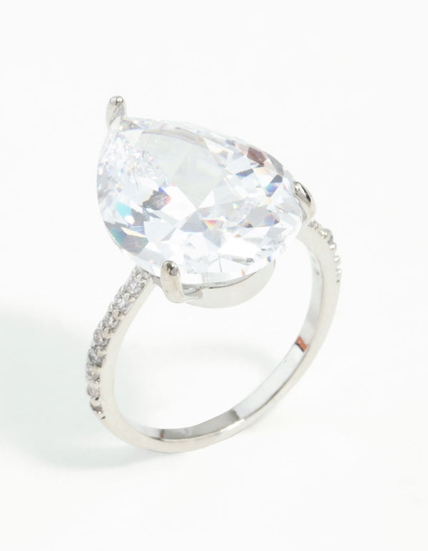 Elegant silver cubic zirconia ring with large pear cut stone side detail view