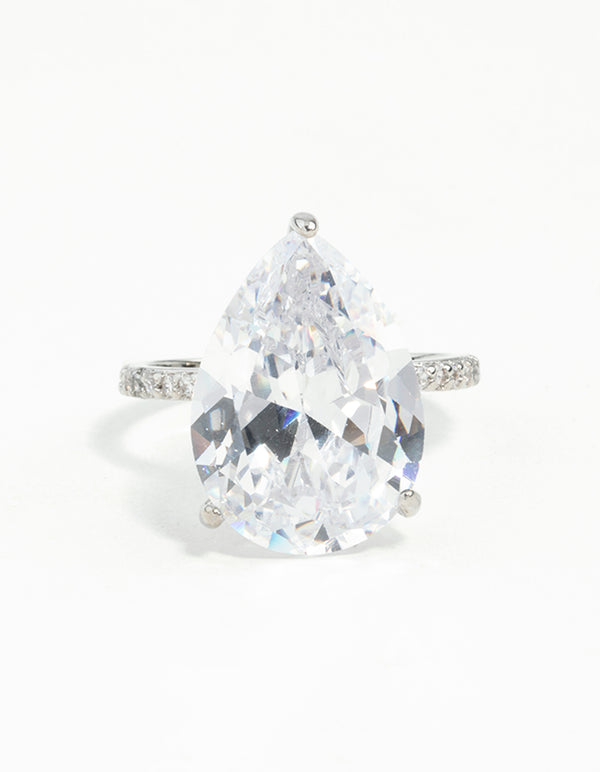 Beautiful silver cubic zirconia ring showcasing large pear cut stone close up view