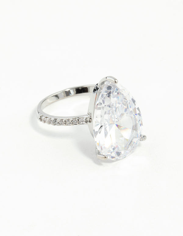 Stunning silver cubic zirconia ring featuring a large pear cut stone front view