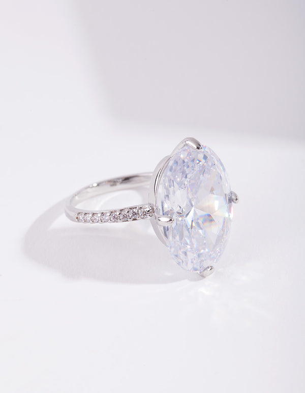 Featuring a silver cubic zirconia large oval stone ring with crystal and statement design front view