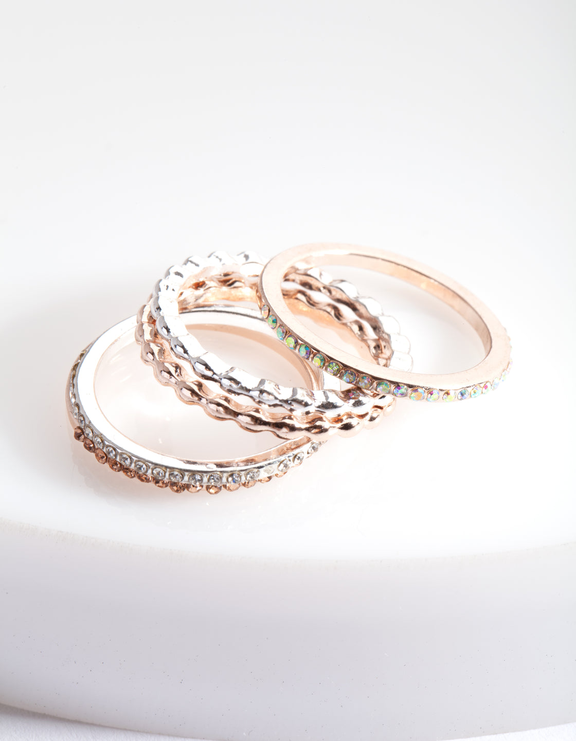 Featuring a mixed metal fine diamante ring 5-pack with textured bands and embellished details side detail view