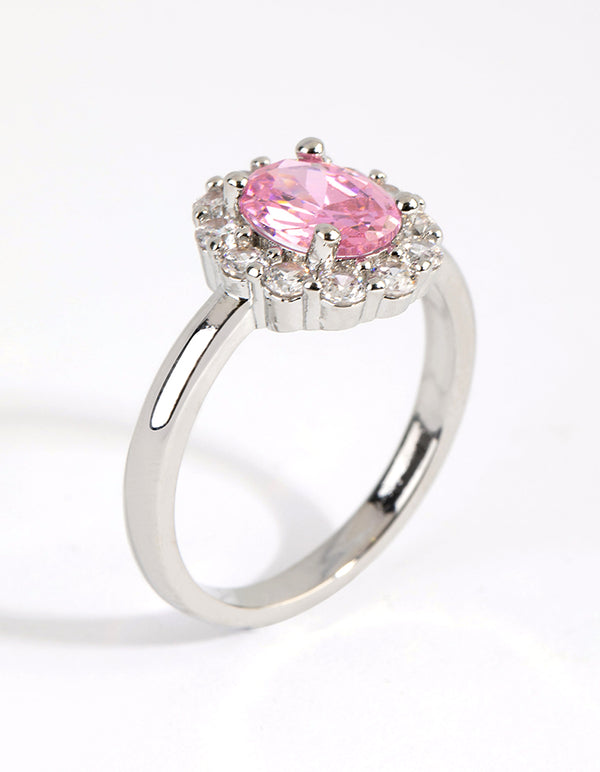Featuring a silver pink cubic zirconia oval ring with light halo setting side detail view