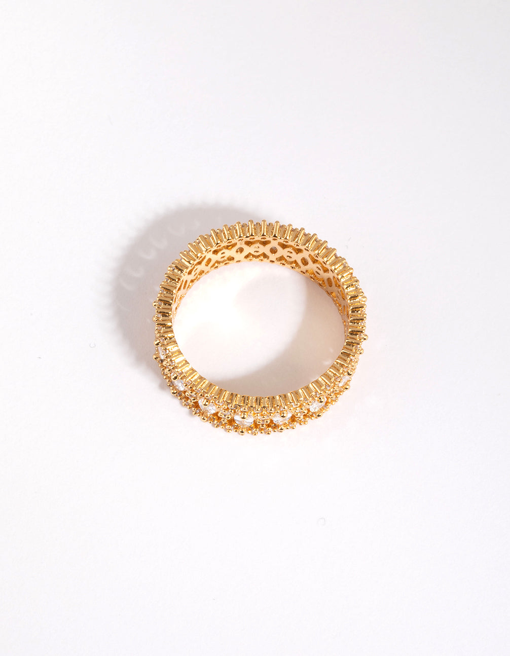 Beautifully crafted gold plated ring with cubic zirconia side detail view