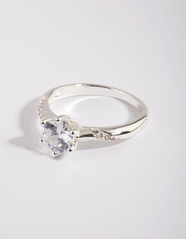 Elegant silver plated twisted ring with cubic zirconia in a dainty style front view