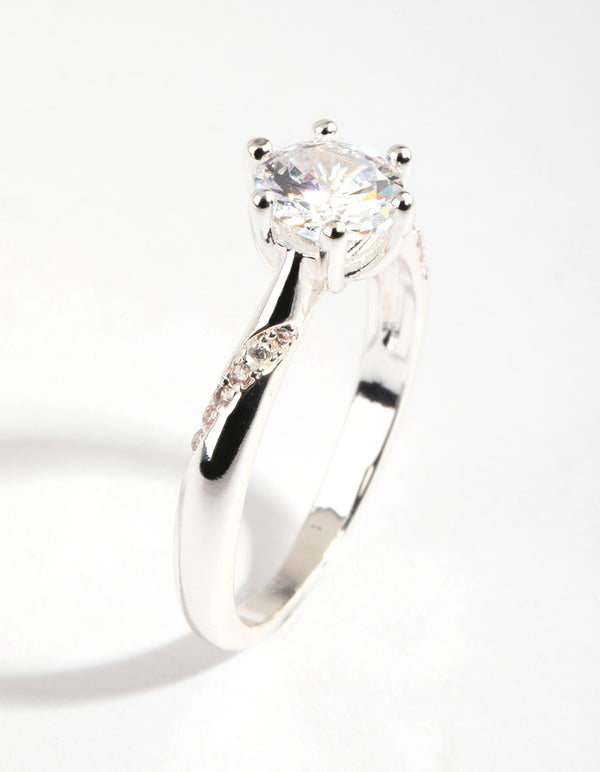 Beautifully crafted silver plated twisted ring with cubic zirconia in a dainty style side detail view
