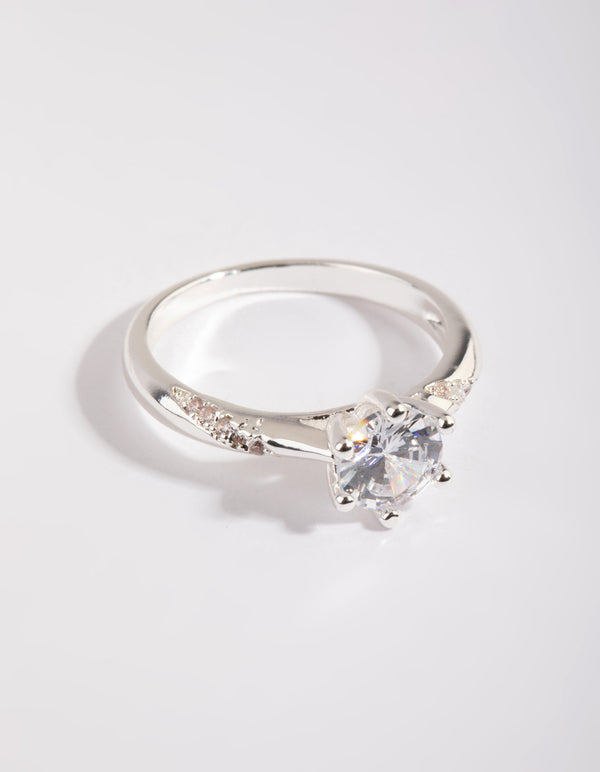 Stunning silver plated twisted ring with cubic zirconia in a dainty style close up view