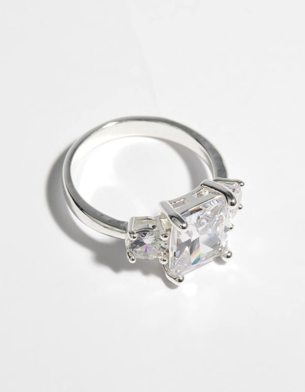 Highlighting a statement cubic zirconia engagement ring with silver detailing side detail view