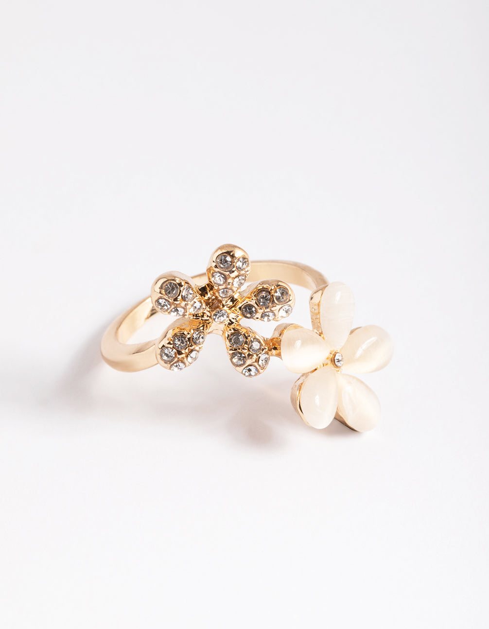 Elegant gold diamante and cateye flower ring accents in statement design side detail view