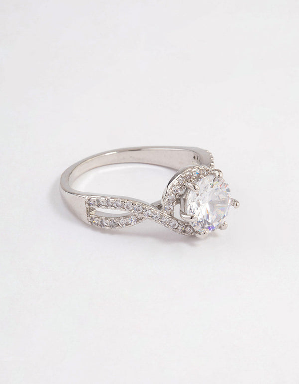 Beautifully crafted infinity halo ring with round crystal in silver side detail view