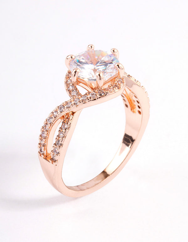 Stunning rose gold round infinity halo ring with cubic zirconia side detail view