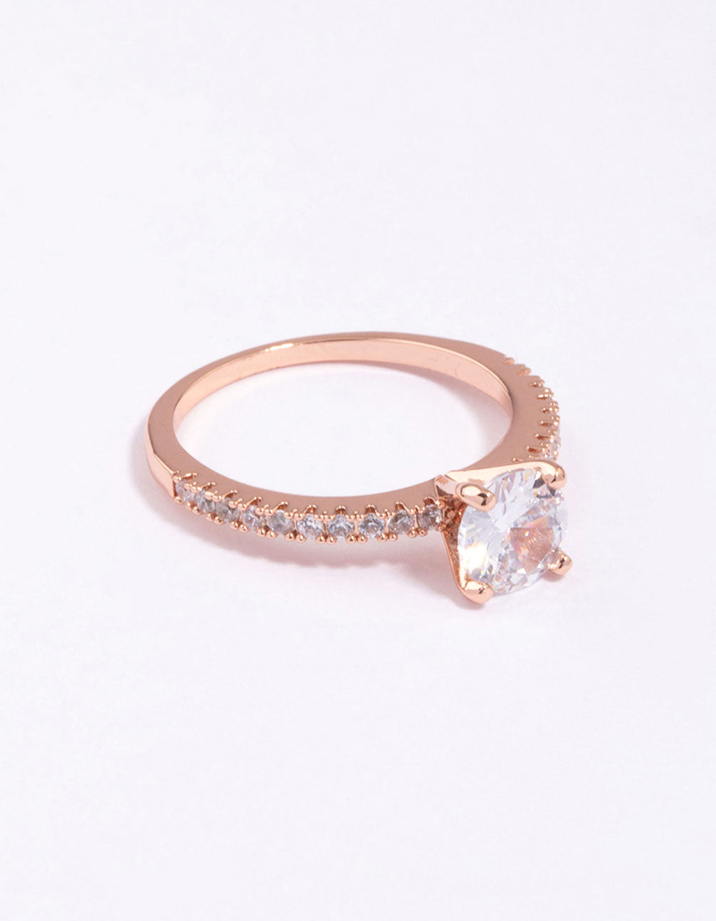 This stunning rose gold plated cubic zirconia ring features a textured band with statement styling side detail view