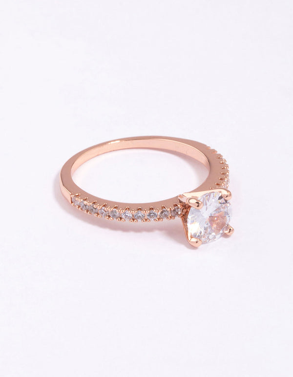 This stunning rose gold plated cubic zirconia ring features a textured band with statement styling side detail view