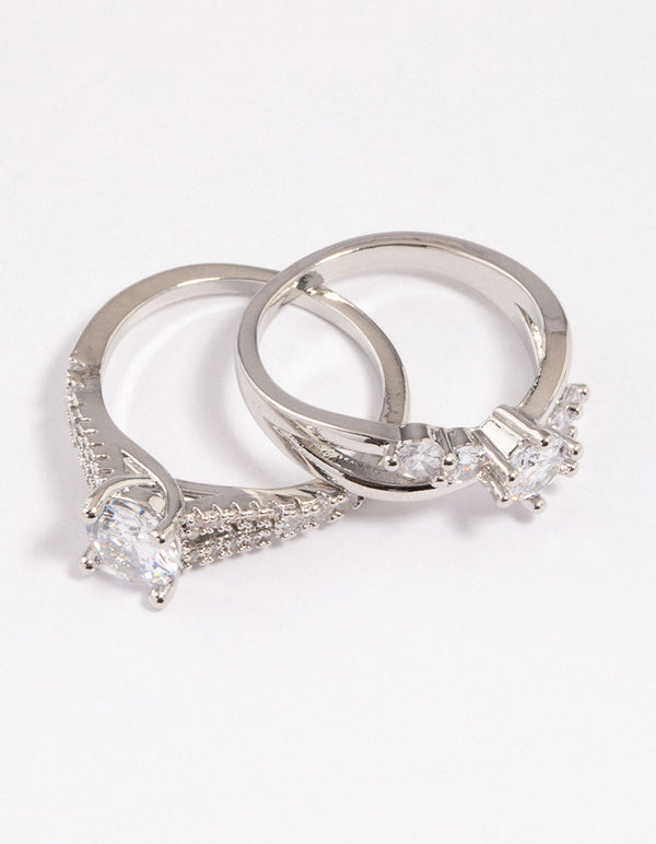 Presenting a diagonal cubic zirconia engagement ring pack with dainty design close up view