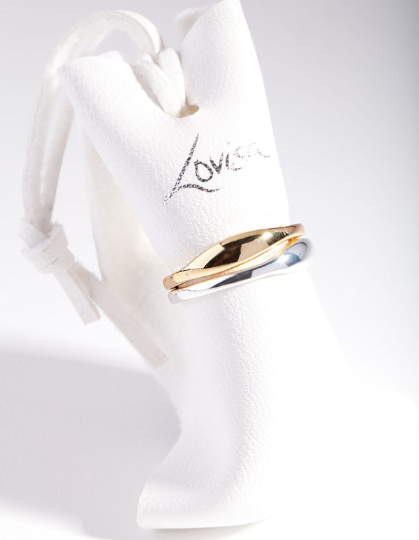 Highlighting silver and gold plated wave band ring set side detail view