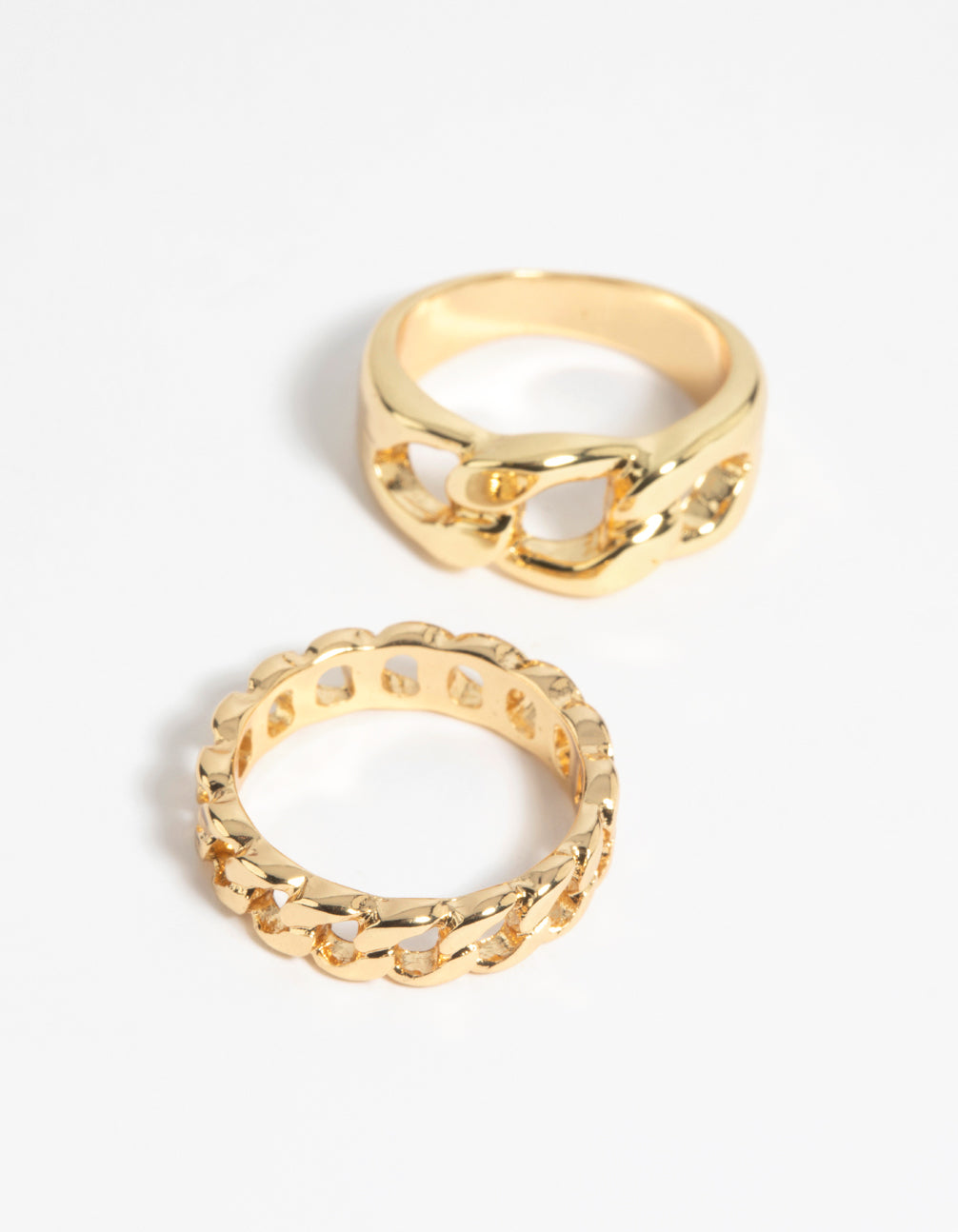 Showcasing a gold chain ring stack pack front view