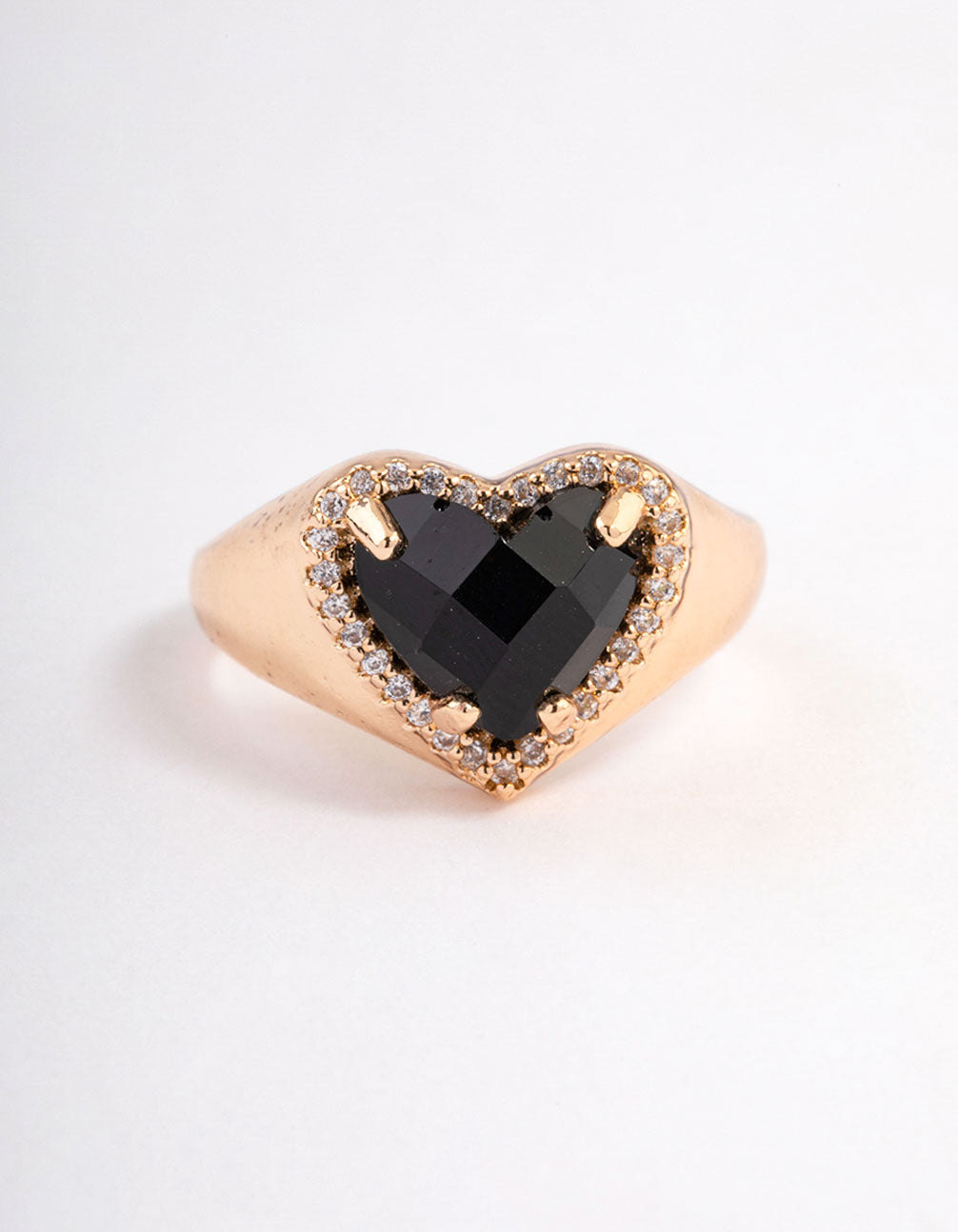 Beautifully crafted gold black statement heart ring close up view
