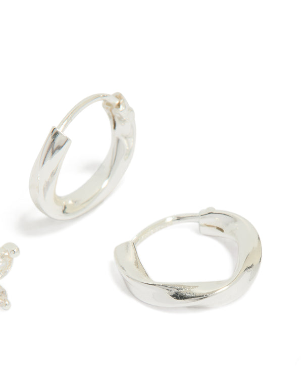 Displaying sterling silver butterfly and hoop stud earrings in a 2-pack post detail view