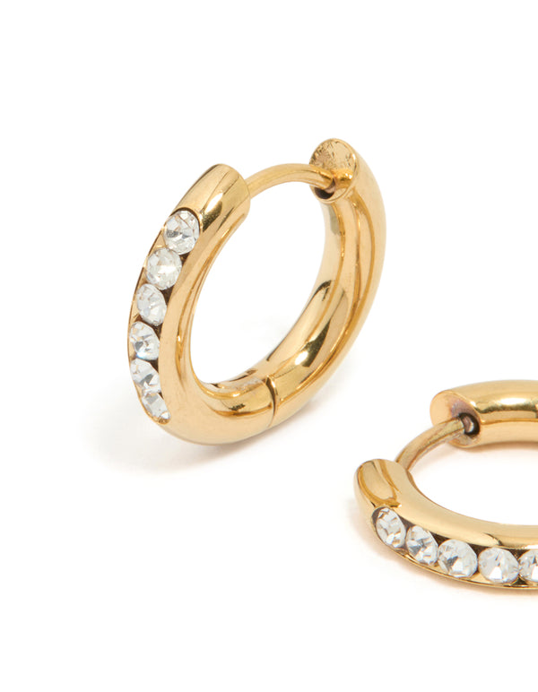 Crafted from waterproof gold plated stainless steel with round diamante clicker hoop closure close up view