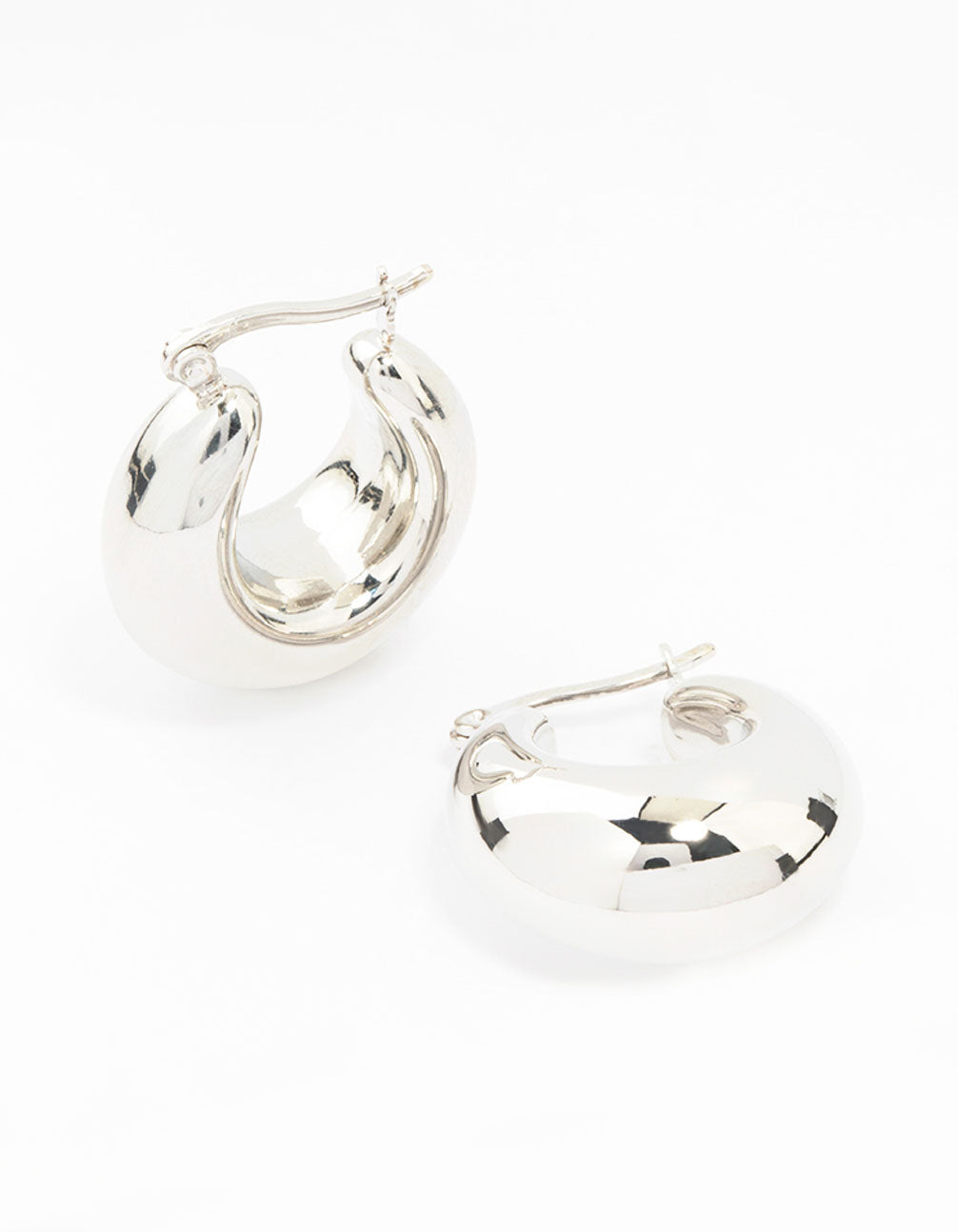 Elegant waterproof stainless steel full bubble hoop earrings in silver front view