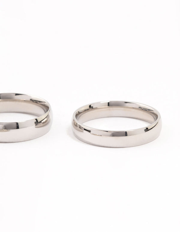 Highlighting waterproof stainless steel plain band rings in silver, sold as a 3-pack close up view
