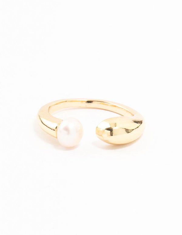 Featuring a white pearl, this gold plated open ring close up view