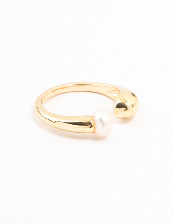 Crafted from gold plated material, this open pearl ring features a white pearl side detail view