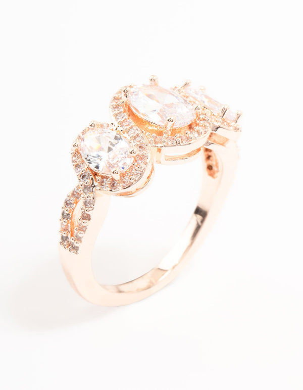 Showcasing rose gold plated ring with trio oval cubic zirconia stones side detail view