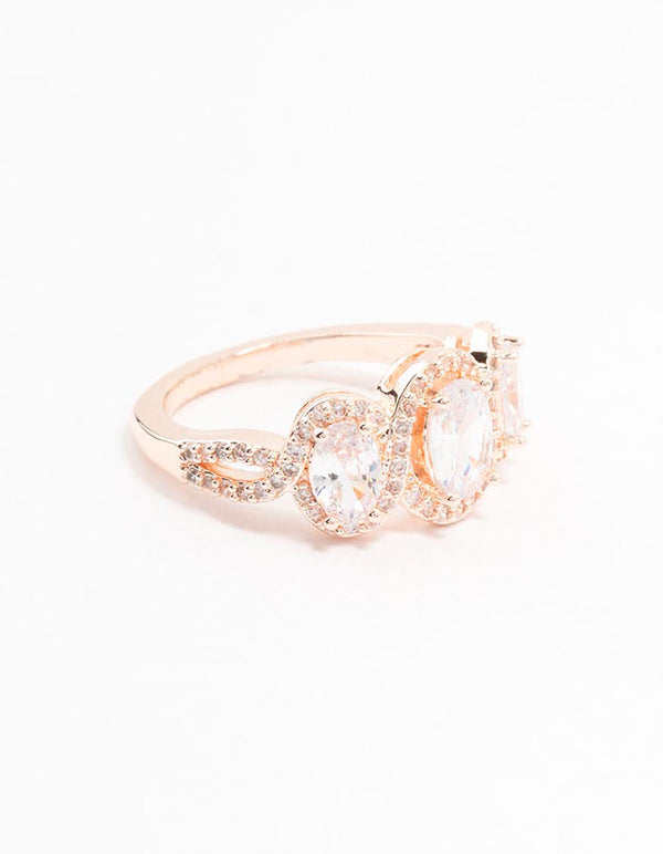 Featuring a trio of oval cubic zirconia stones set in rose gold plated metal front view
