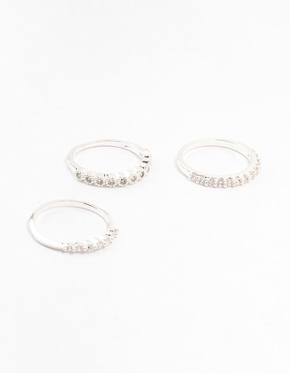 Crafted from silver plated metal with round cubic zirconia stones in a stackable 3-pack design front view
