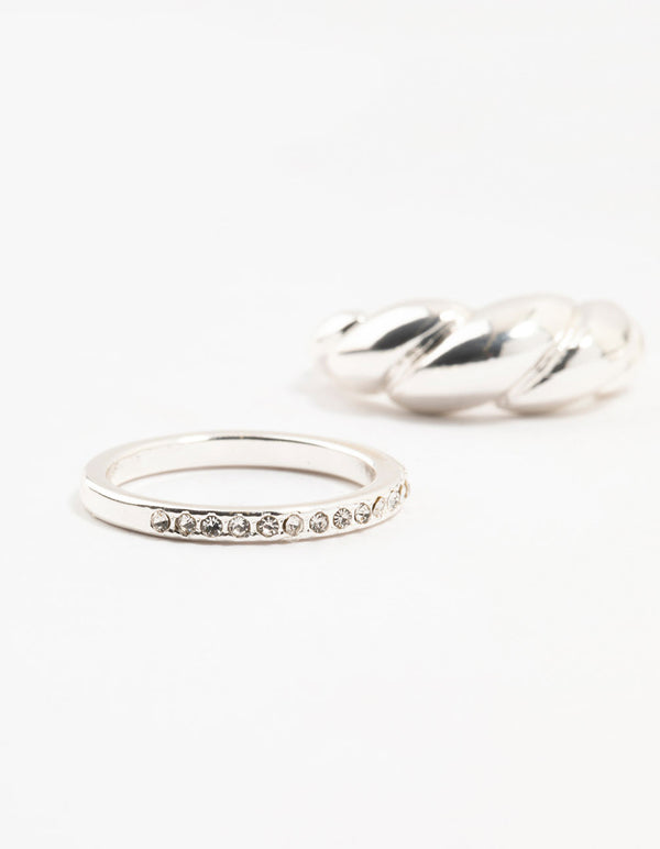 Showcasing silver plated diamante twisted ring pack with stackable design close up view